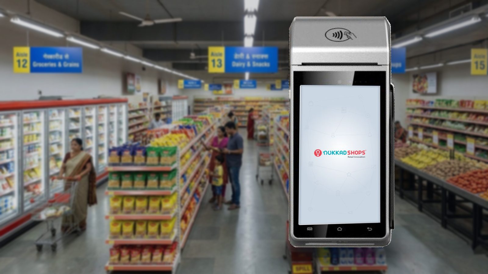 NukkadShops NS MPOS handheld with billing software, in a supermarket aisle