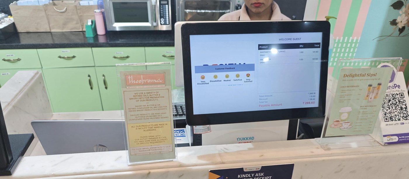 NukkadShops POS billing at a Theobroma counter, Delhi Airport